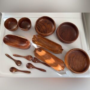 Set of 13 wooden bowls and spoons in various shapes and sizes